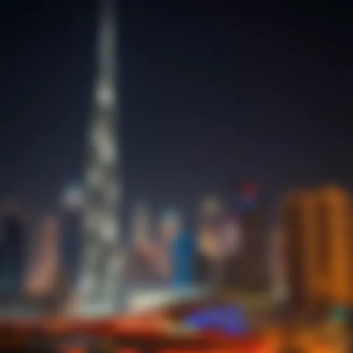 Night view of Carson Tower illuminated against the Dubai skyline