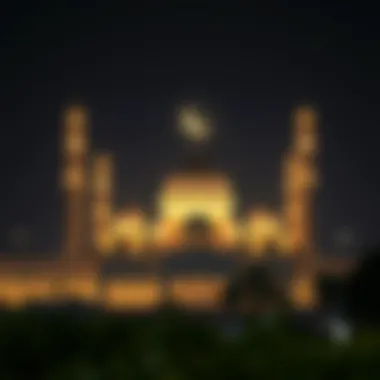 Illuminated Mosque during Ramadan Mosque illuminated at night with crescent moon in the sky